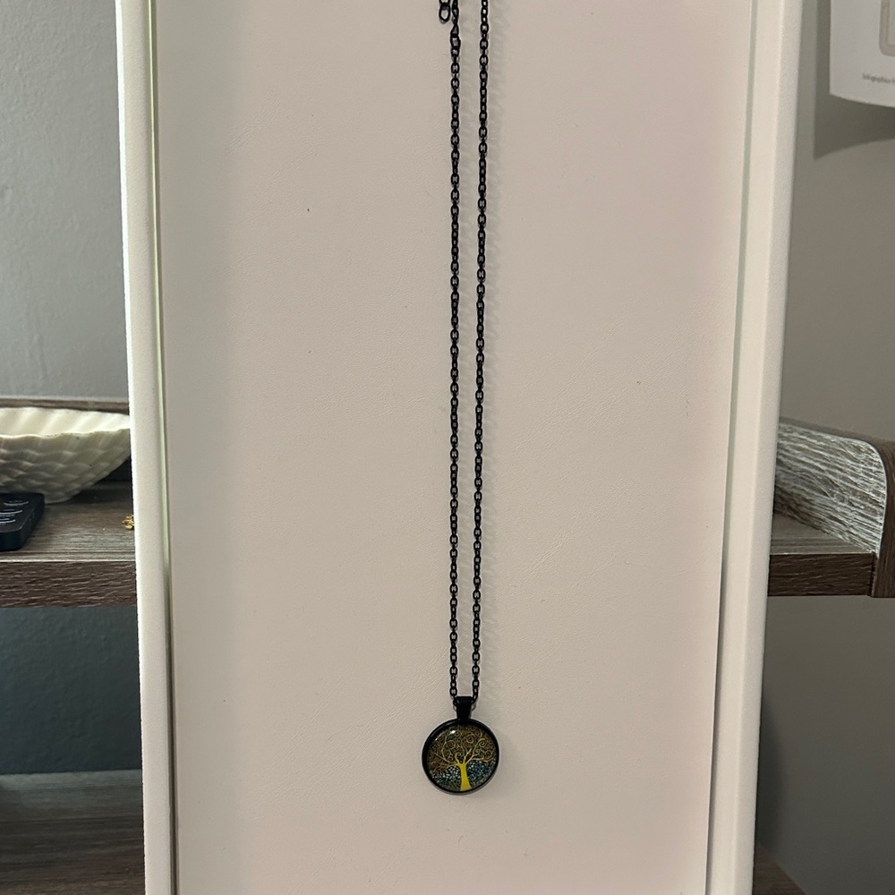 Elegant Black and Gold Tree Pendant Necklace